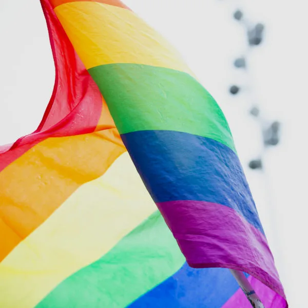 Rainbow pride flag representing inclusive gender affirming pelvic floor care